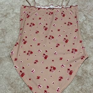 Pink floral bodysuit in size small